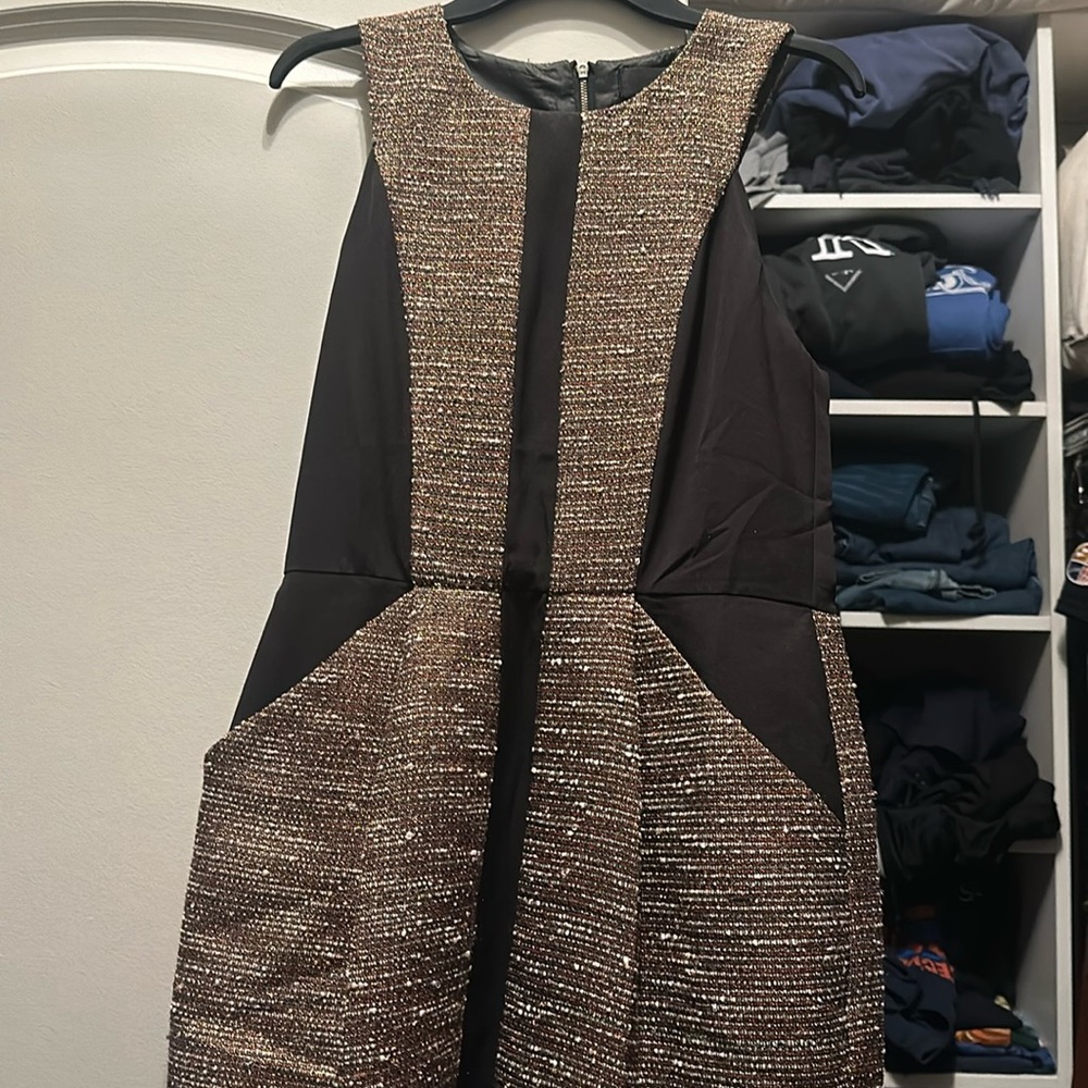 Dress perfect for the holidays.  Has pockets and gold accents!